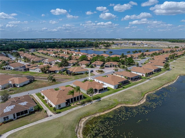 aerial view with a water view and a residential view