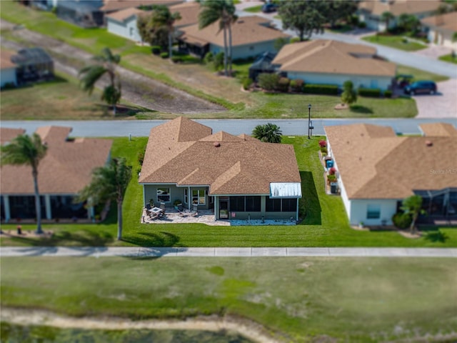 drone / aerial view with a residential view