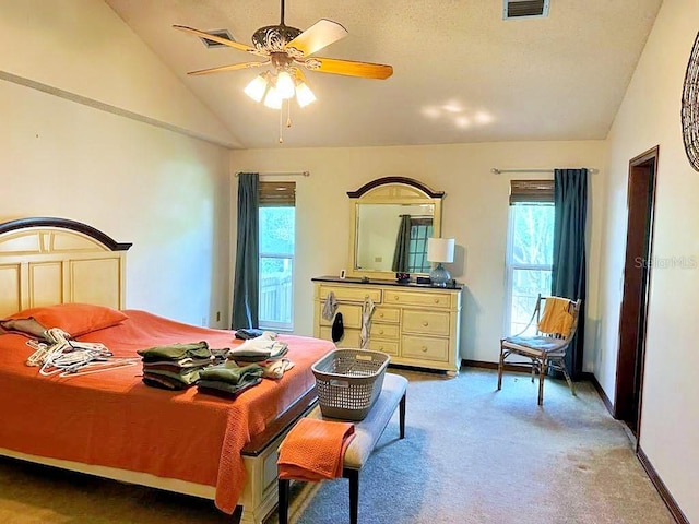 2761 Graniteridge Ct, Orange Park, FL 32065 - carpeted bedroom with vaulted ceiling, multiple windows, baseboards, and a ceiling fan