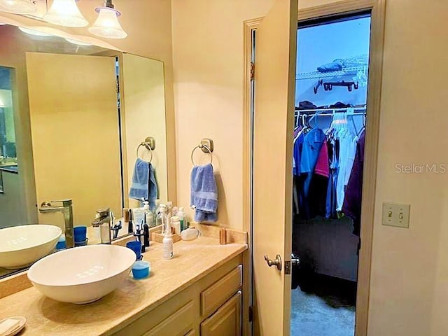 2761 Graniteridge Ct, Orange Park, FL 32065 - bathroom with vanity and a walk in closet