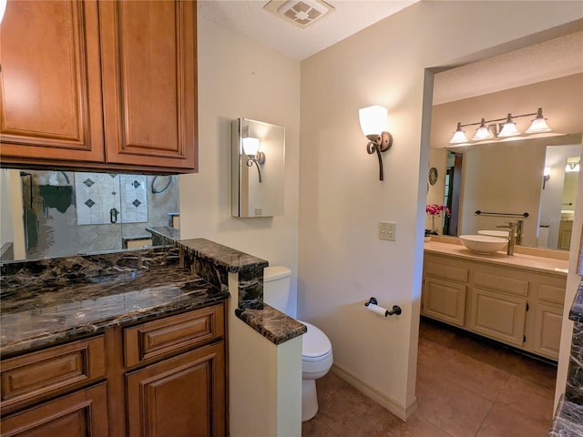 2761 Graniteridge Ct, Orange Park, FL 32065 - bathroom featuring toilet, tile patterned floors, backsplash, vanity, and baseboards