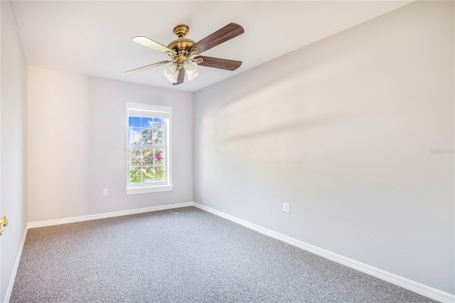 unfurnished room with ceiling fan, baseboards, and carpet floors