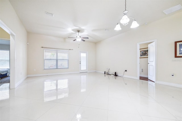 404 Rio Grande Ct, Poinciana, FL 34759 - unfurnished room with visible vents, baseboards, light tile patterned floors, and ceiling fan with notable chandelier