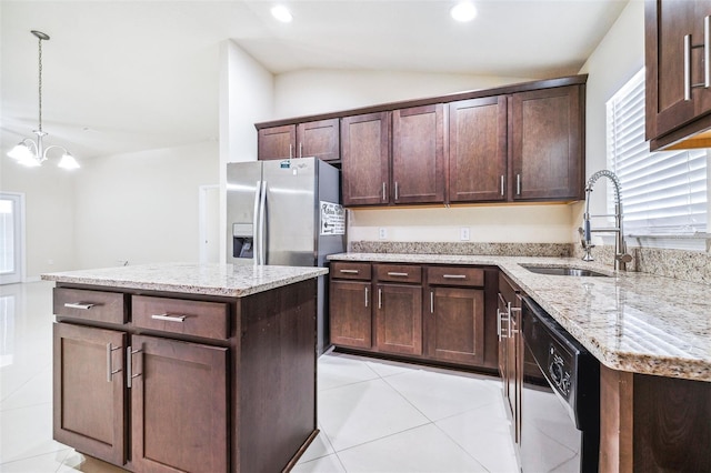 404 Rio Grande Ct, Poinciana, FL 34759 - kitchen with stainless steel fridge with ice dispenser, dark brown cabinetry, dishwasher, a sink, and lofted ceiling