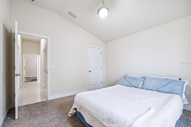 404 Rio Grande Ct, Poinciana, FL 34759 - carpeted bedroom featuring visible vents, baseboards, and vaulted ceiling