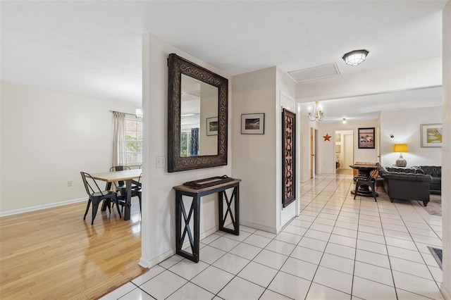 102 Lake Ring Dr, Winter Haven, FL 33884 - corridor with light wood-style flooring and baseboards