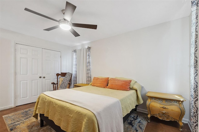 102 Lake Ring Dr, Winter Haven, FL 33884 - bedroom featuring baseboards, a closet, a ceiling fan, and wood finished floors
