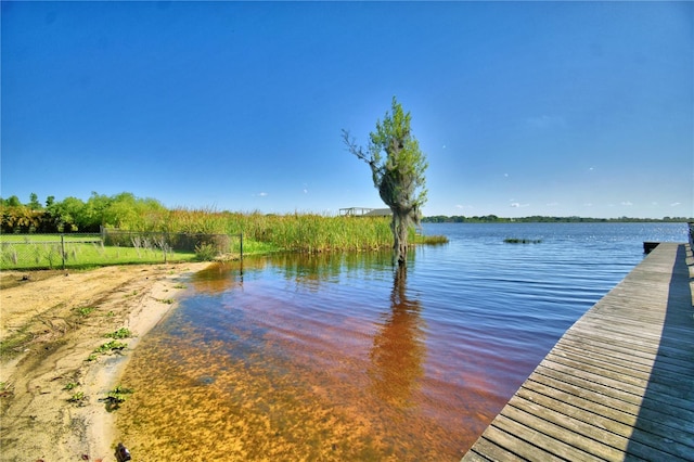 2611 State Road 557, Lake Alfred, FL 33850 - view of dock featuring fence and a water view