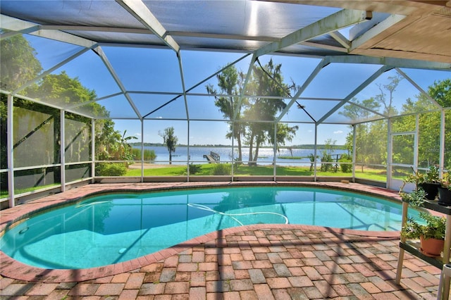 2611 State Road 557, Lake Alfred, FL 33850 - outdoor pool featuring a lanai, a patio area, and a water view
