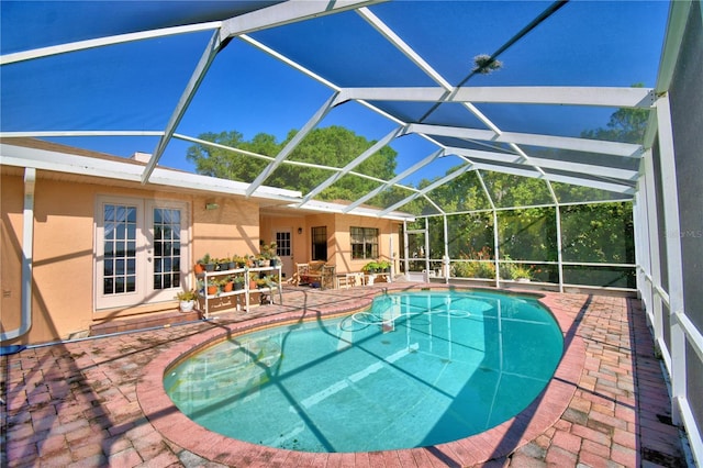 2611 State Road 557, Lake Alfred, FL 33850 - pool featuring a lanai, french doors, and a patio area