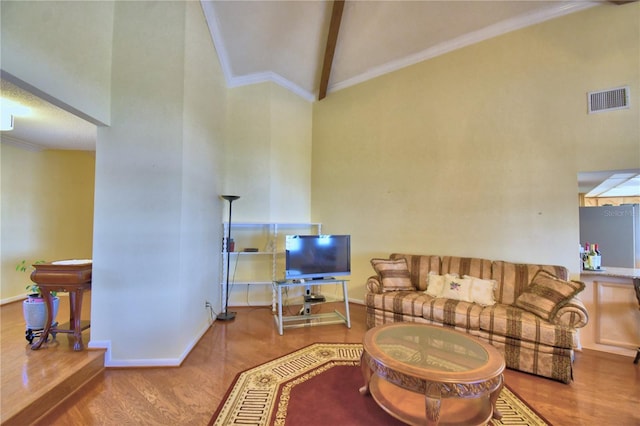 2611 State Road 557, Lake Alfred, FL 33850 - living room with high vaulted ceiling, visible vents, and wood finished floors