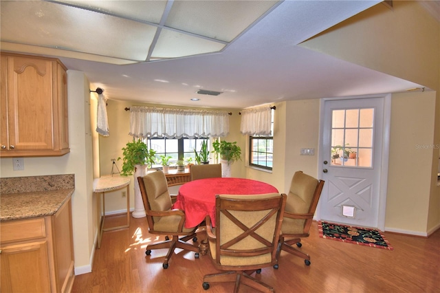 2611 State Road 557, Lake Alfred, FL 33850 - dining area with baseboards and wood finished floors