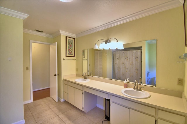 2611 State Road 557, Lake Alfred, FL 33850 - bathroom featuring double vanity, ornamental molding, a sink, and tile patterned flooring