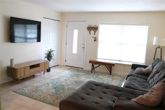 24391 NW 172nd Ave, High Springs, FL 32643 - foyer entrance featuring light tile patterned floors and baseboards
