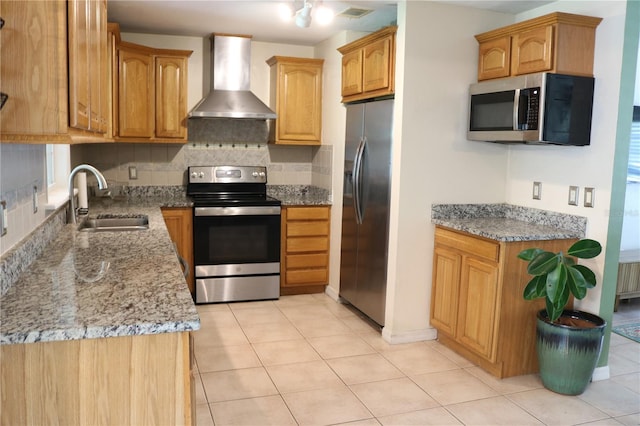 24391 NW 172nd Ave, High Springs, FL 32643 - kitchen featuring wall chimney exhaust hood, a sink, light stone countertops, backsplash, and stainless steel appliances