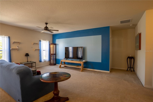 249 Haines Blvd, Winter Haven, FL 33881 - carpeted living area with plenty of natural light, visible vents, baseboards, and a ceiling fan