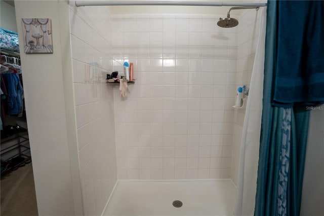 249 Haines Blvd, Winter Haven, FL 33881 - bathroom with a shower stall and a walk in closet