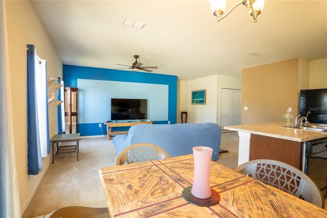 249 Haines Blvd, Winter Haven, FL 33881 - dining room featuring baseboards, light colored carpet, ceiling fan, and visible vents