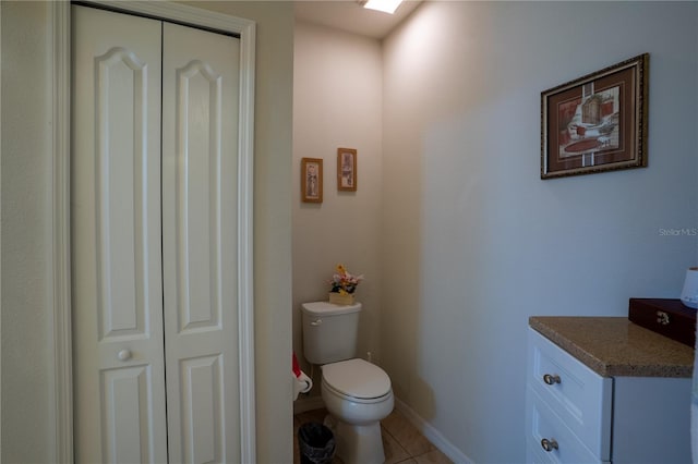 249 Haines Blvd, Winter Haven, FL 33881 - bathroom featuring tile patterned floors, toilet, vanity, and baseboards