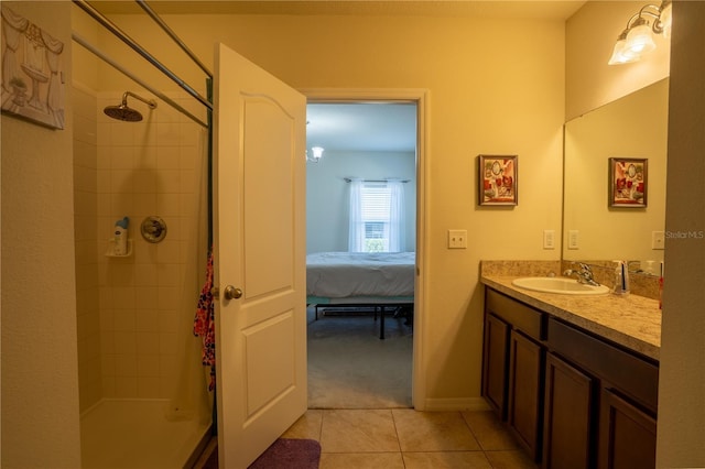249 Haines Blvd, Winter Haven, FL 33881 - full bath with ensuite bathroom, baseboards, vanity, tile patterned flooring, and a stall shower