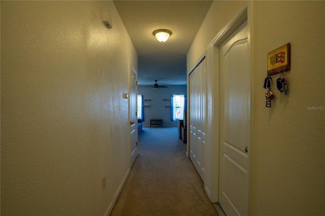 249 Haines Blvd, Winter Haven, FL 33881 - corridor featuring baseboards and carpet