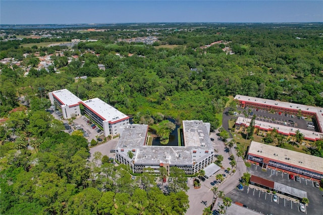 aerial view featuring a view of trees