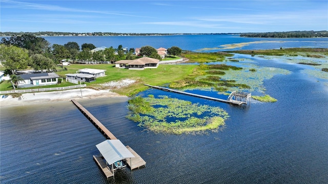 bird's eye view with a water view