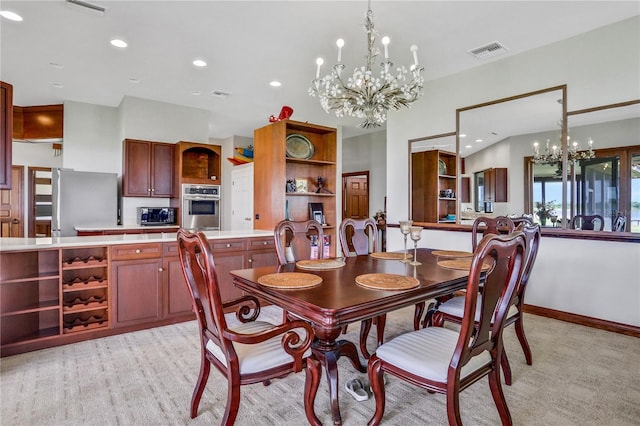 dining room with baseboards, a chandelier, recessed lighting, light carpet, and visible vents