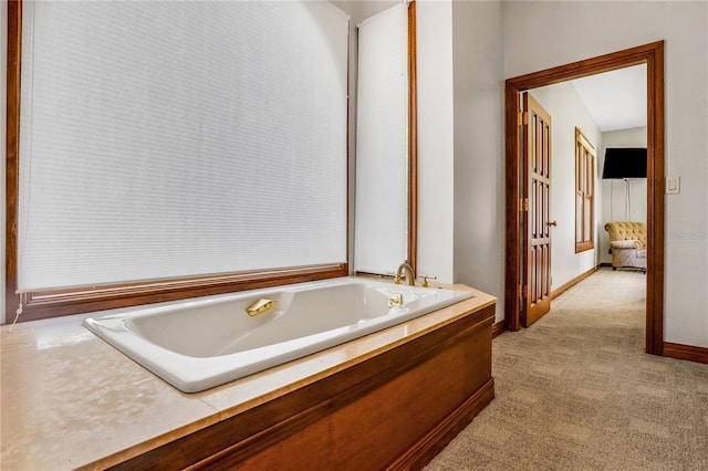 bathroom featuring a garden tub