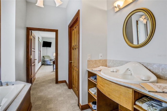 full bathroom featuring a bath and a sink