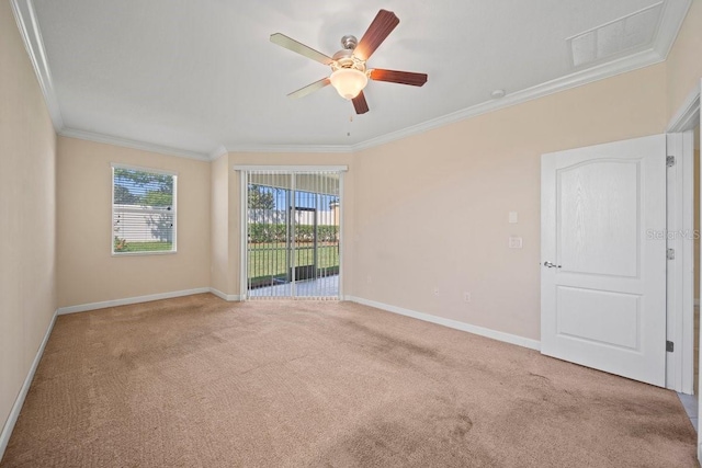 unfurnished room featuring visible vents, a ceiling fan, light carpet, ornamental molding, and baseboards