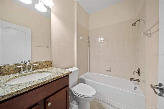 bathroom featuring shower / bath combination, vanity, and toilet