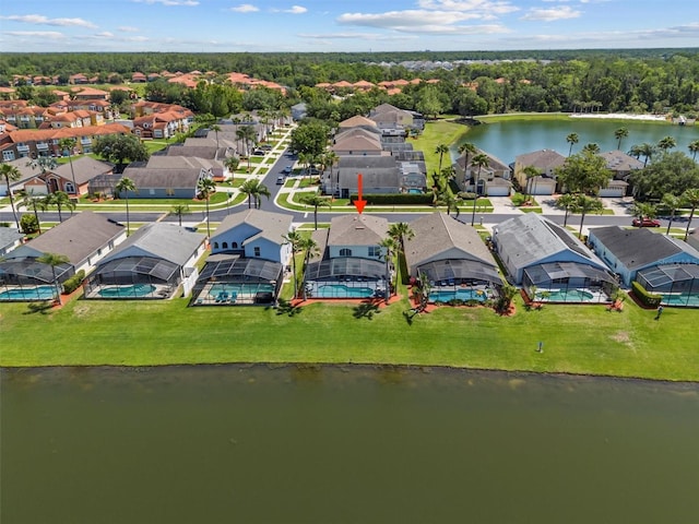 aerial view featuring a water view and a residential view