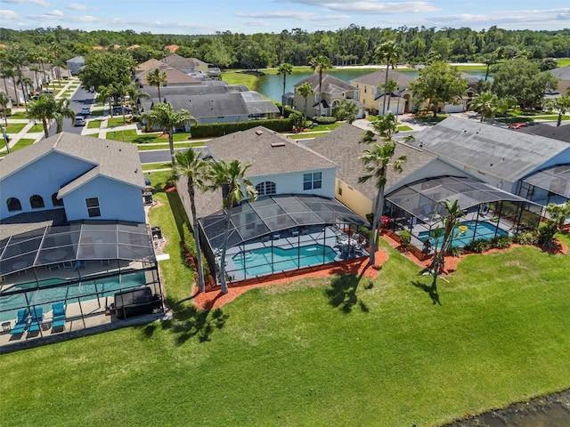 aerial view featuring a water view and a residential view