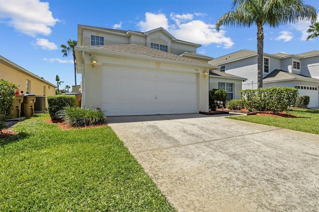 traditional home with an attached garage, stucco siding, a front lawn, and concrete driveway
