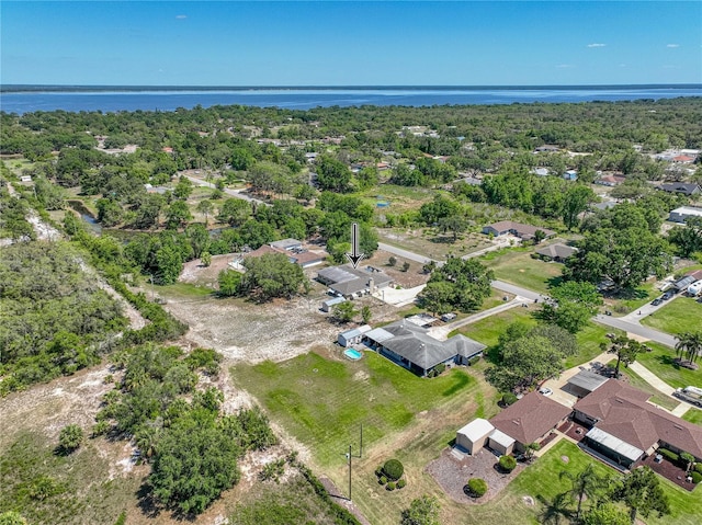 bird's eye view featuring a residential view and a water view
