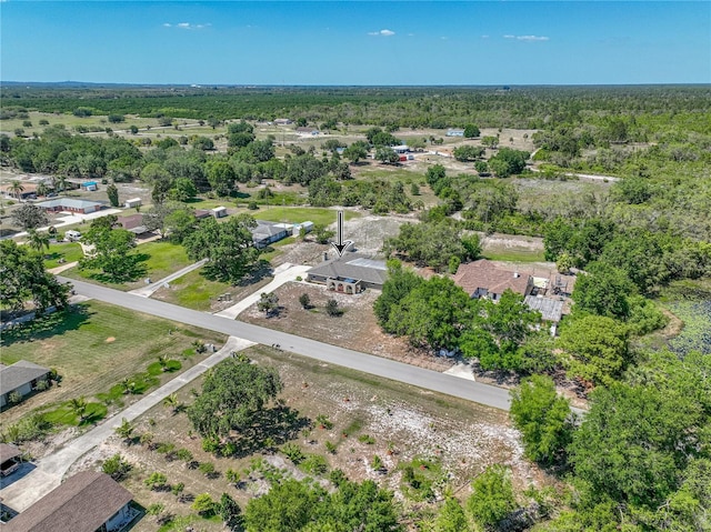 aerial view featuring a forest view