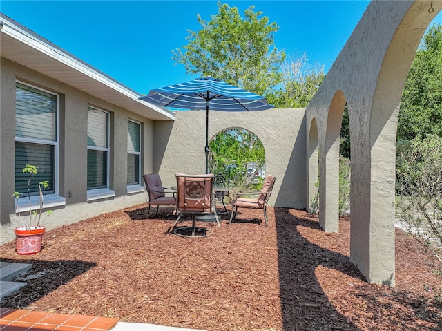 view of yard with outdoor dining area