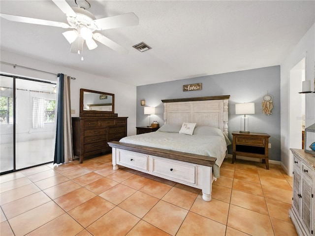 bedroom featuring ceiling fan, access to exterior, visible vents, and light tile patterned floors