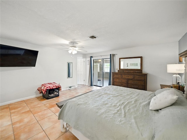bedroom featuring tile patterned floors, access to exterior, visible vents, baseboards, and ceiling fan