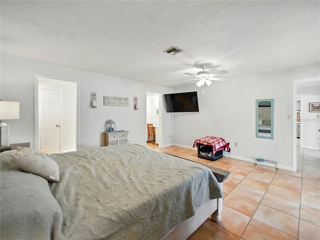 bedroom with baseboards, visible vents, light tile patterned floors, and ceiling fan