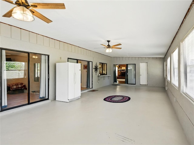 unfurnished sunroom featuring a healthy amount of sunlight