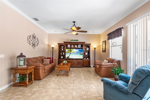 177 Costa Loop, Auburndale, FL 33823 - living area with ceiling fan, light tile patterned flooring, ornamental molding, and baseboards
