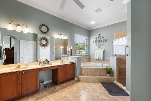 177 Costa Loop, Auburndale, FL 33823 - full bathroom with a garden tub, ornamental molding, a shower stall, tile patterned flooring, and a ceiling fan