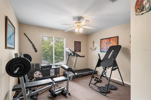 177 Costa Loop, Auburndale, FL 33823 - exercise room featuring a ceiling fan, a textured ceiling, carpet floors, and baseboards