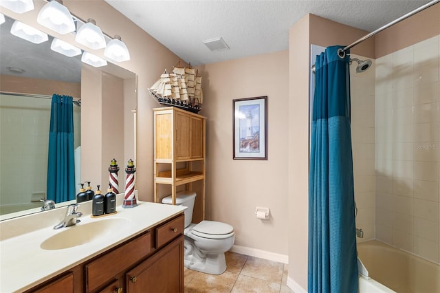 177 Costa Loop, Auburndale, FL 33823 - full bath with toilet, tile patterned floors, a textured ceiling, shower / bathtub combination with curtain, and vanity