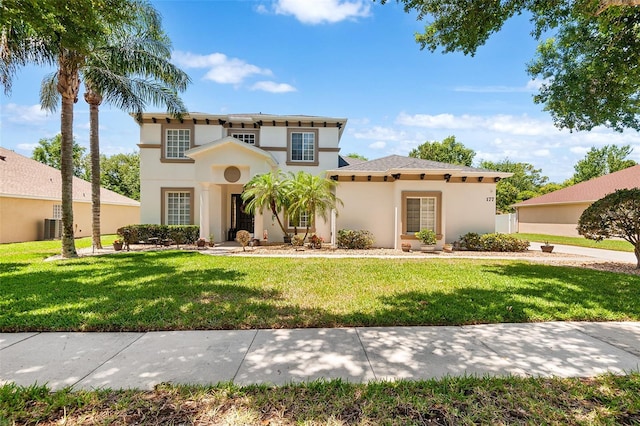 177 Costa Loop, Auburndale, FL 33823 - mediterranean / spanish home featuring stucco siding and a front lawn