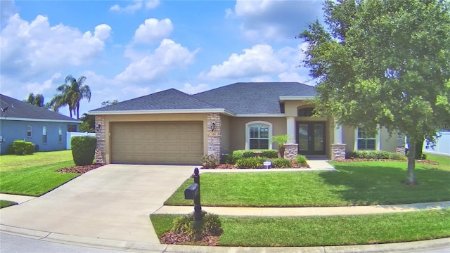 186 Viola Dr, Auburndale, FL 33823 - view of front of property with french doors, stucco siding, an attached garage, a front lawn, and concrete driveway