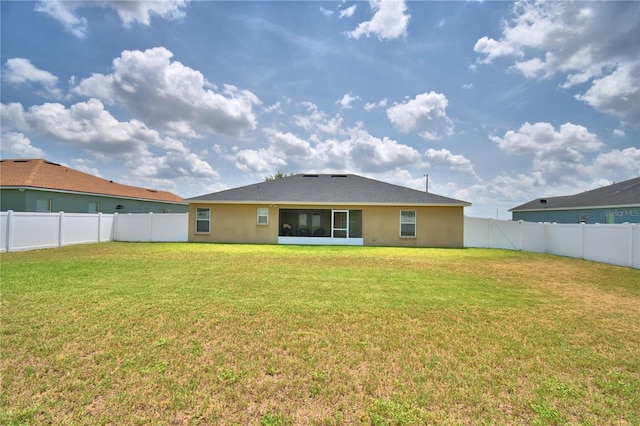 186 Viola Dr, Auburndale, FL 33823 - rear view of house with stucco siding