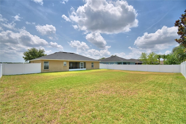 186 Viola Dr, Auburndale, FL 33823 - back of house with stucco siding